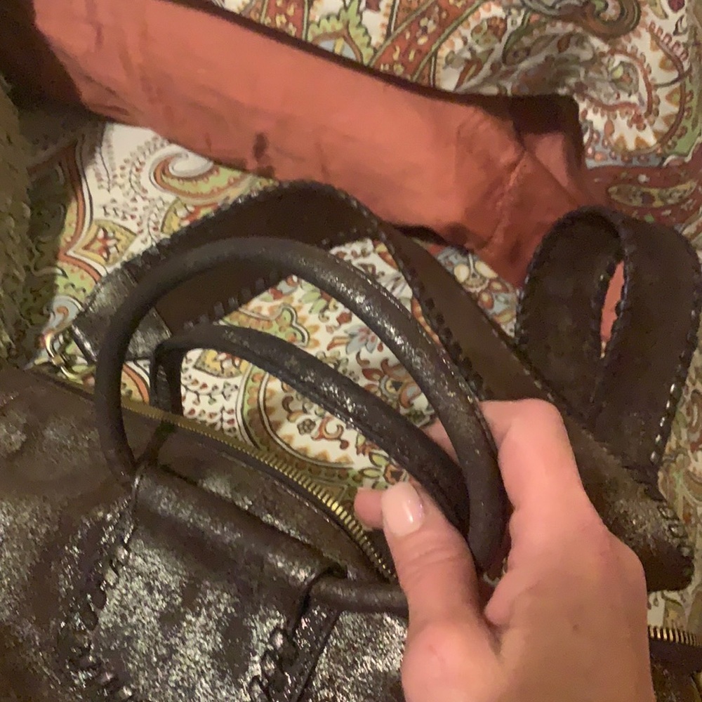 This is the largest bag hobo makes It was purchased in December 2020.